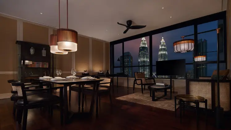 GIF showcasing a stylish lounge and dining area with sweeping city views at The RuMa Hotel and Residences