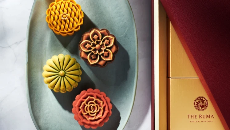 Luxurious mooncake gift box in Nyonya Sambal Hae Bee, Honey Longan, Ondeh, and Callebaut 811 flavours for Mid-Autumn Festival 2024 at RuMa Hotel.