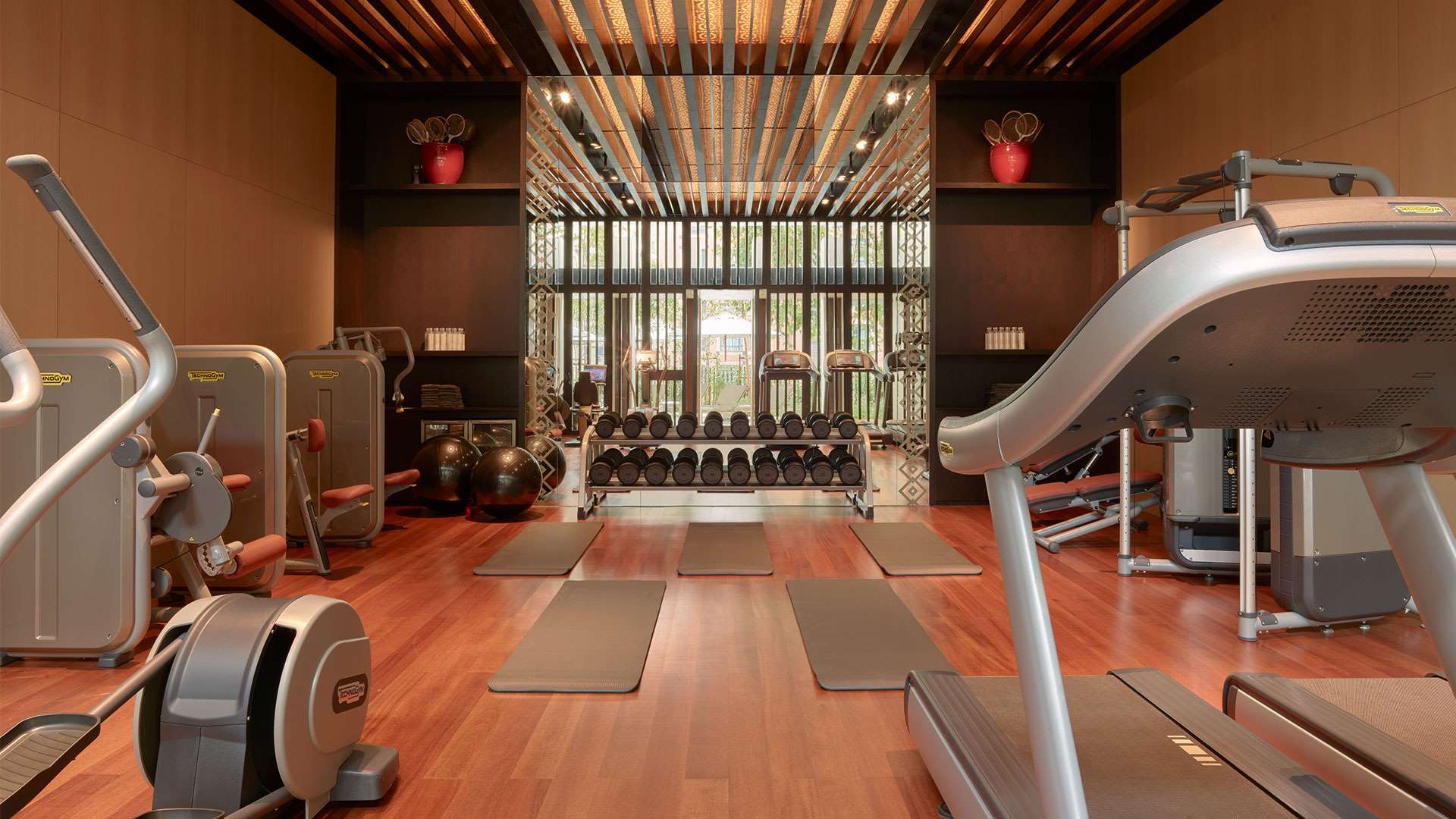 Fitness equipment in the Gym at The RuMa Hotel & Residences